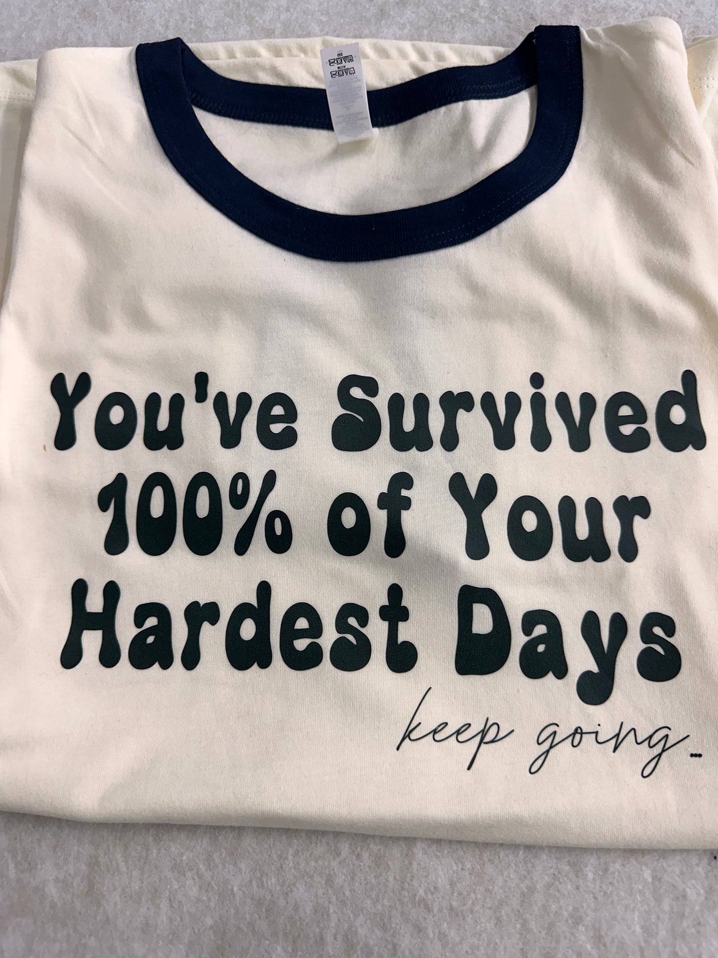 Ringer Tee You’ve Survived 100% of your hardest days.