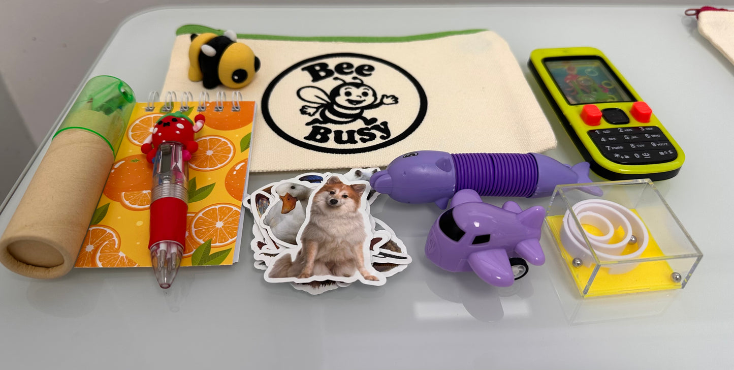 Bee Busy Bags including bag,writing pad, fun pen, colored pencil pack, stickers plus at least 4 sensory toys - plus a Bee fidget toy. Available in girls, boys and gender neutral collections. Age 2-6